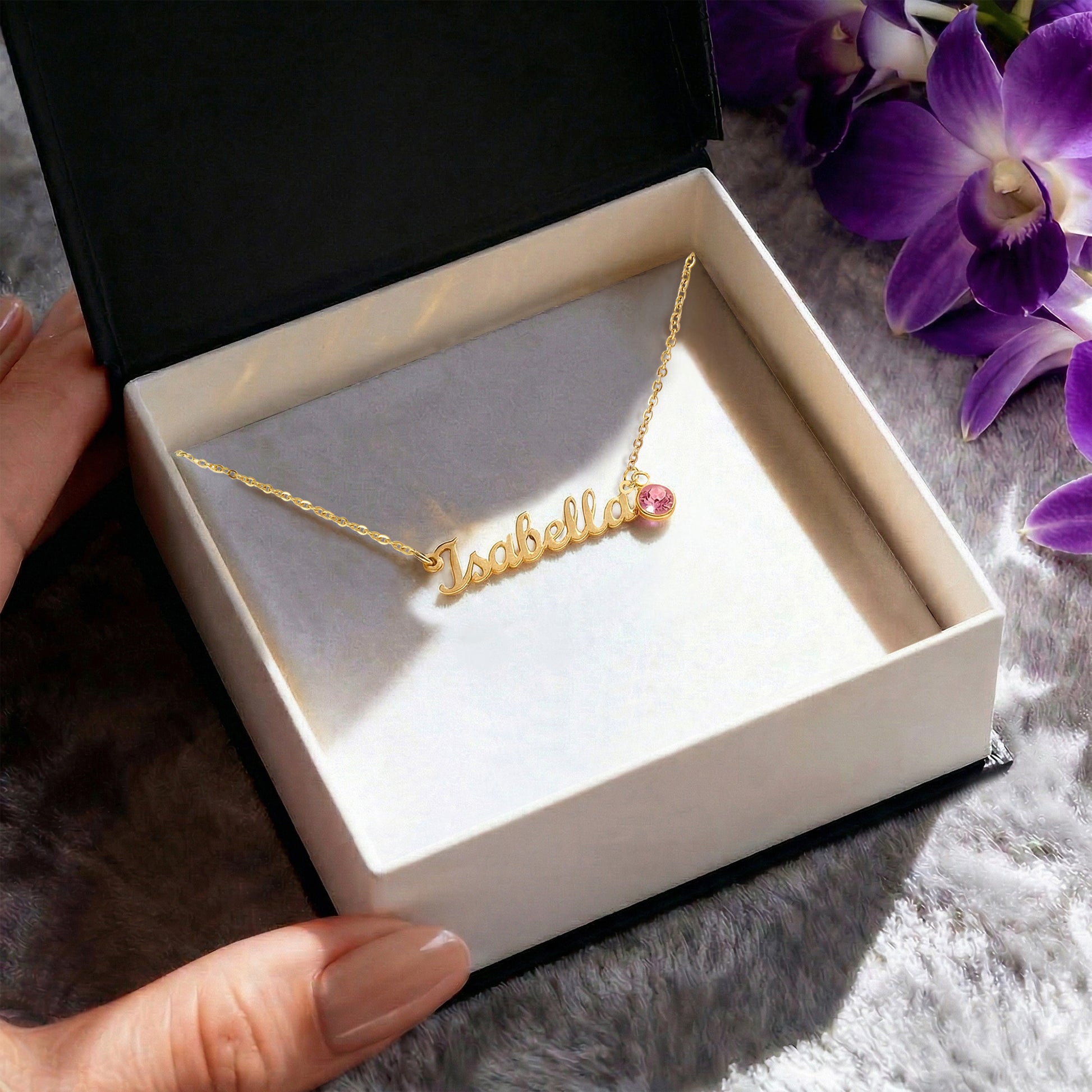 18k gold name necklace with birthstone in a Goldlett gift box
