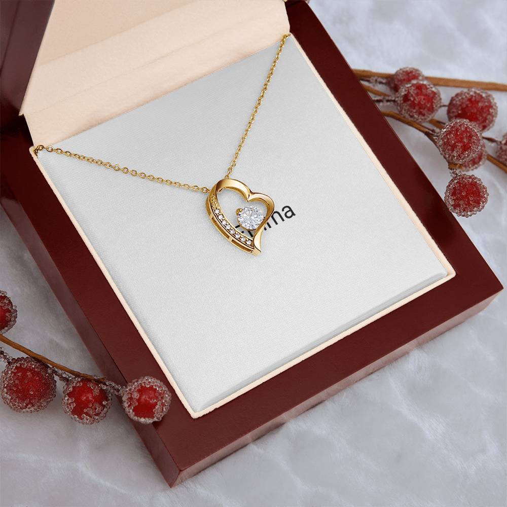 Gold Forever Love necklace gift-boxed with a rose