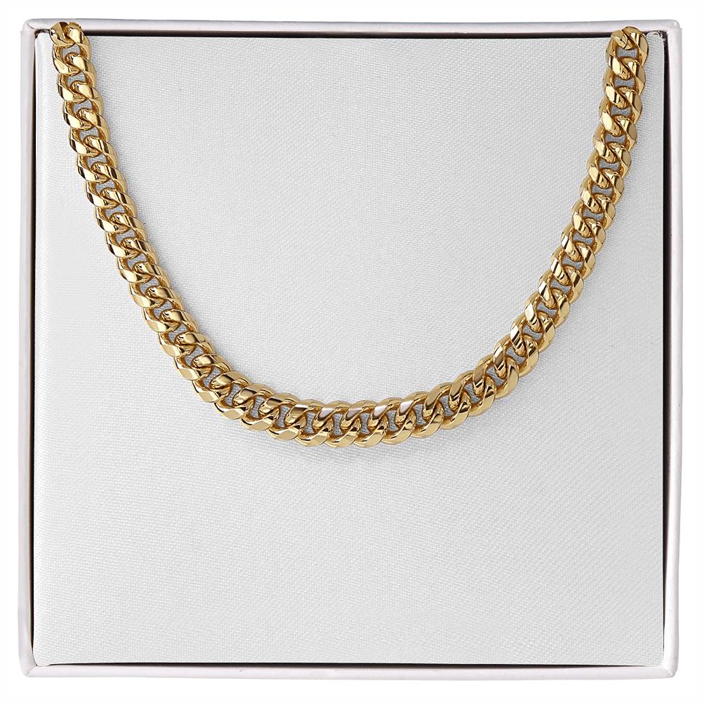 Gold Cuban link chain, laid flat