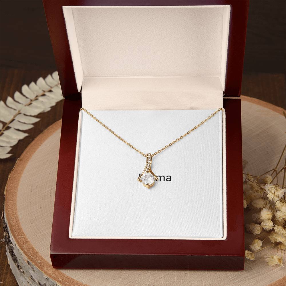 Gold Alluring Beauty necklace presented in a gift box