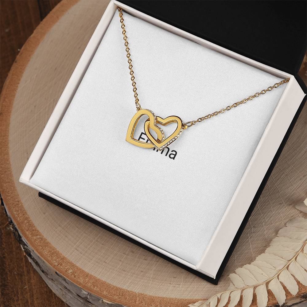 Gold interlocking hearts necklace in a gift box
