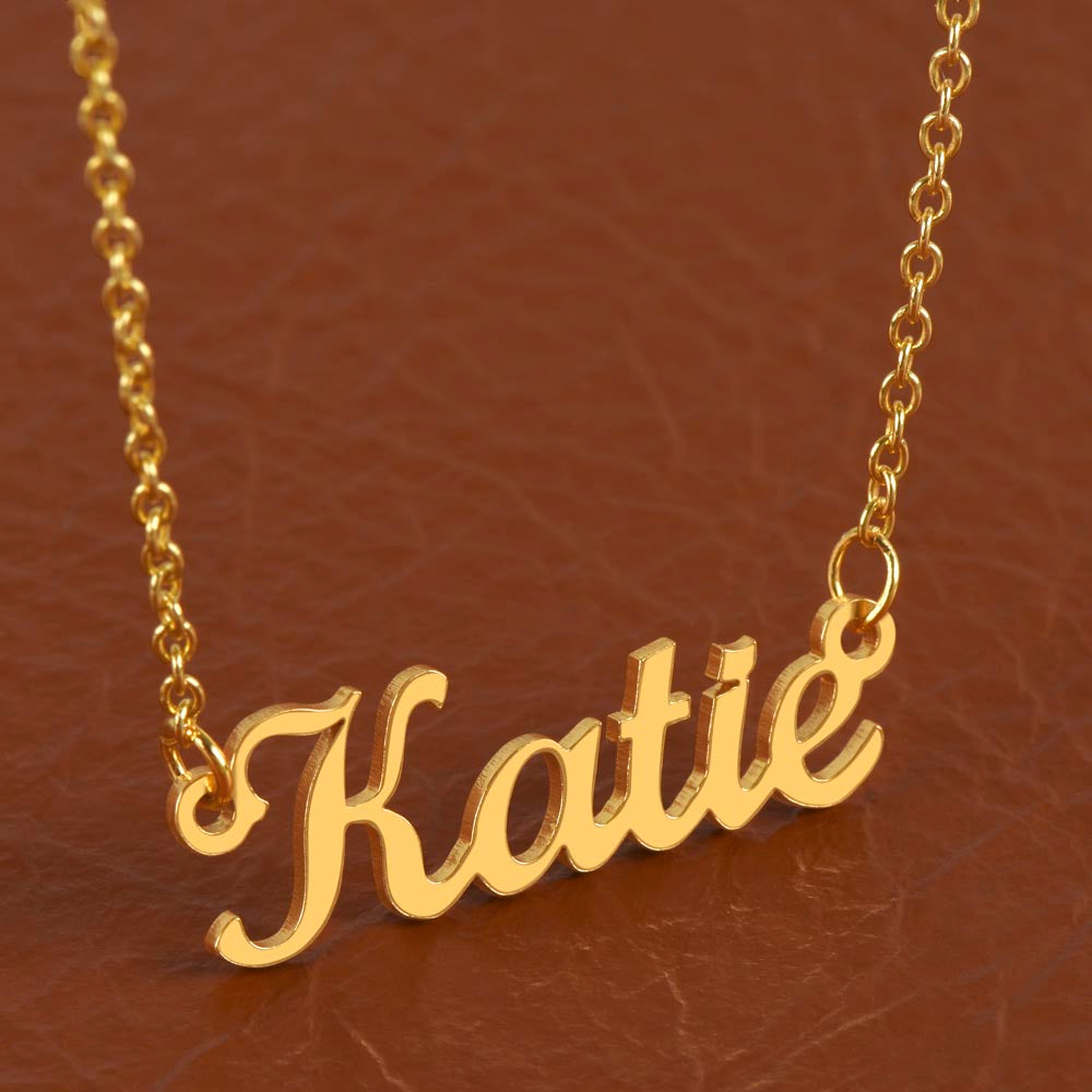 18k gold name necklace personalized with a name, on white