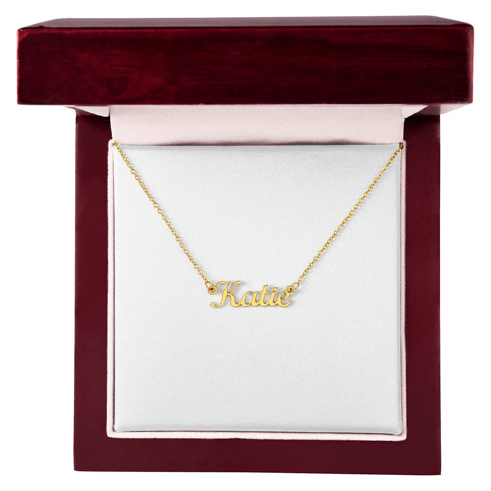 Gold name necklace in flowing script, personalized to order