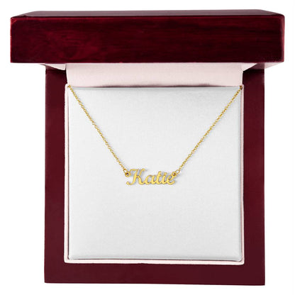Gold name necklace in flowing script, personalized to order