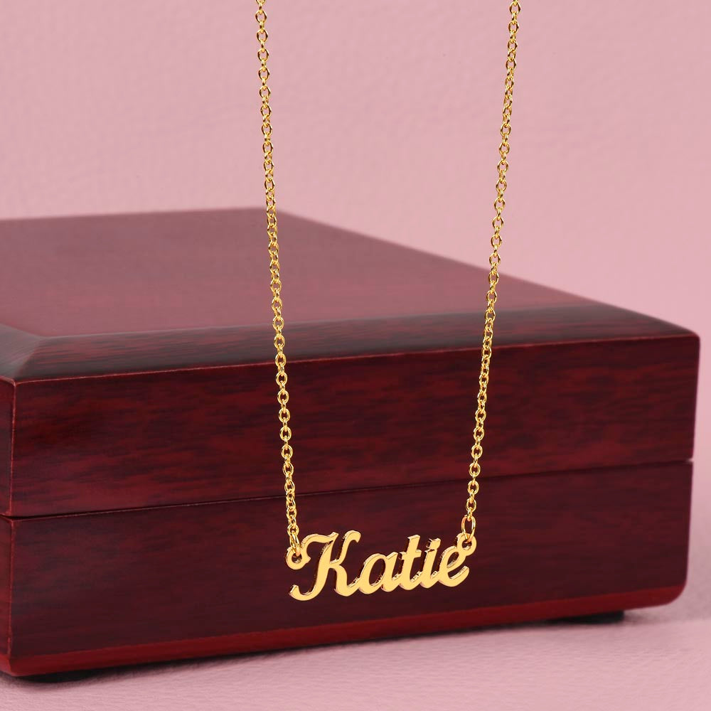Personalized gold name necklace in a wooden gift box