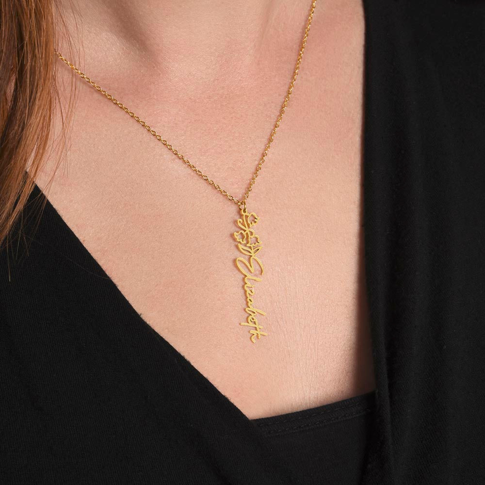 Gold flower name necklace with birthstone, worn detail