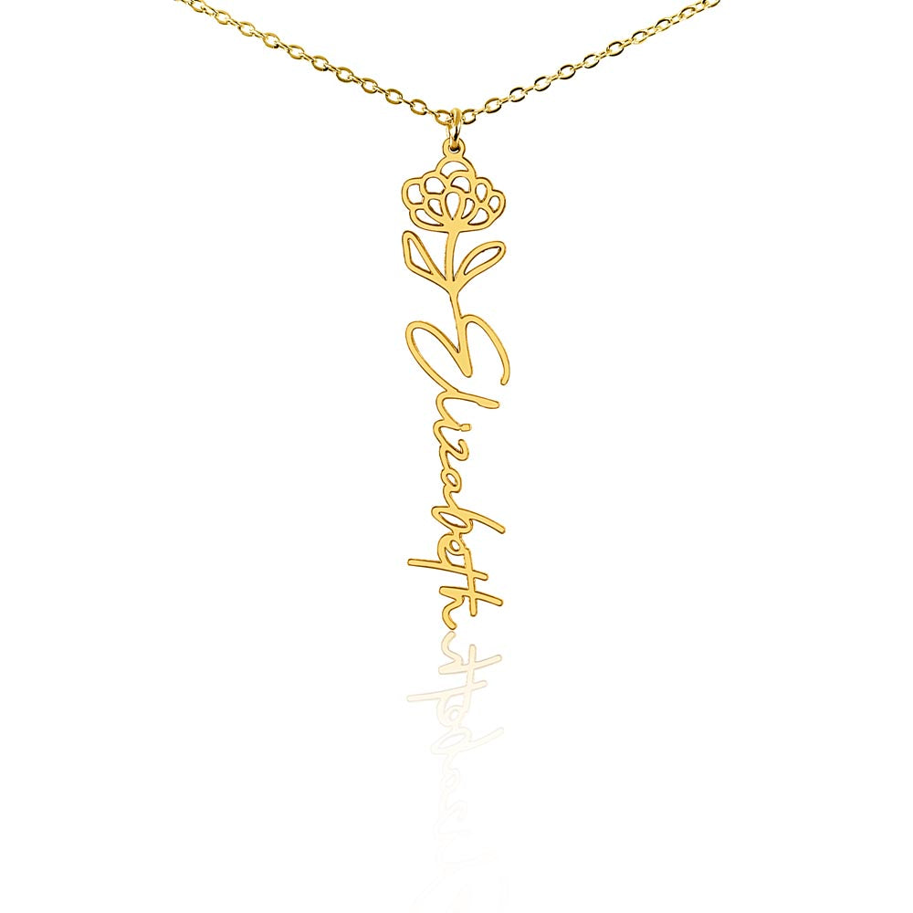 Gold name necklace with a delicate flower and birthstone, close up